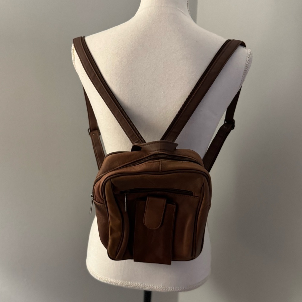 C bags leather backpack can also be shoulder bag. Tan